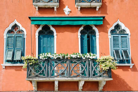 Venice, Italy - May 30, 2020: Terrace of a Venetian palace decorated with flowers along the Giudecca canalのeditorial素材