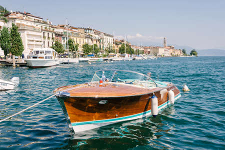 SalÃ² Lake Garda, Italy - September 12, 2020: Riva luxury motorboat anchored on the lakefrontのeditorial素材