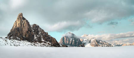 Panorama of the Ampezzo Dolomites. First snow of autumn.の写真素材