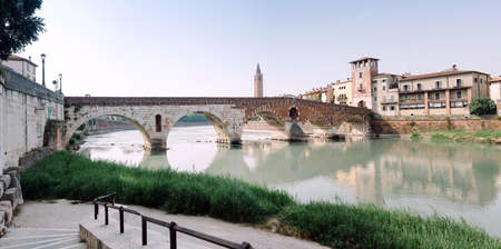 Verona, Italy - The Pietra bridge is the oldest bridge in Verona over the Adige river, the only one left from Roman times.の写真素材