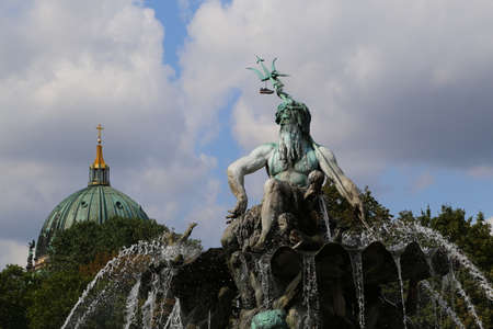 Neptune Fountain and dome of Berlin Cathedralの写真素材