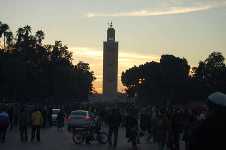 people walking down the main market square Djemma El Fna at nightのeditorial素材