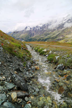 Streams from mountain rivers flow in Plateau Rosa, Breuil-Cervinia, Italy