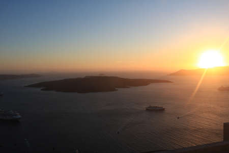 Beautiful sunset in Santorini island, Greeceの写真素材
