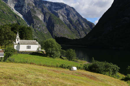 Naeroyfjord idyllic fjord landscape reflection, ship ferry, Norway, scandinaviaの写真素材