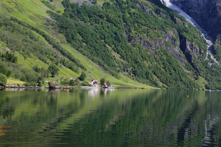 Naeroyfjord idyllic fjord landscape reflection, ship ferry, Norway, scandinaviaの写真素材