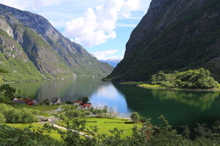 Naeroyfjord idyllic fjord landscape reflection, ship ferry, Norway, scandinaviaの写真素材