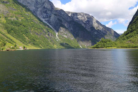 Naeroyfjord idyllic fjord landscape reflection, ship ferry, Norway, scandinaviaの写真素材