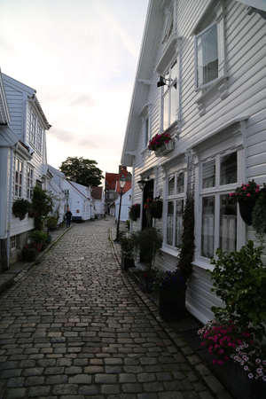 Street with white wooden houses in old centre of Stavangerのeditorial素材