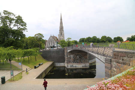 English church St. Alban's and pedestrian bridge in copenhagenのeditorial素材
