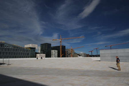 Tourists exploring Oslo Opera House, Norwayのeditorial素材