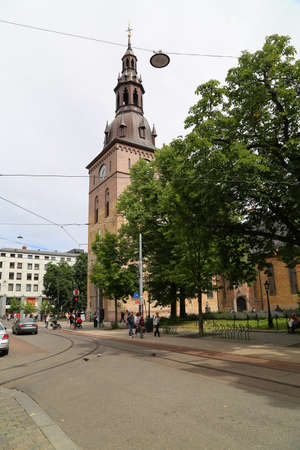 Crowded Karl Johans gate, Oslo, Norway. People sightseeing and relaxing in outdoors cafesのeditorial素材