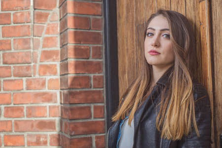 Beautiful girl in a photo shoot in the cityの写真素材