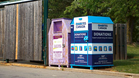 Oakville, Ontario / Canada - September 15, 2020: A blue donation bin of Diabetes Canada. Diabetes Canada is a registered national charity.のeditorial素材