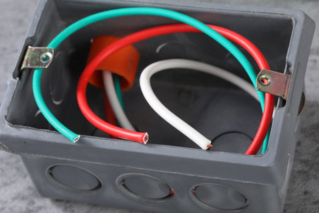 Electrical junction box with wires and cables. Close-up.の写真素材
