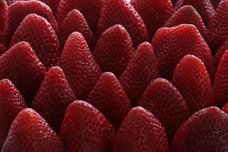 strawberry background macro close up, texture of fresh red strawberriesの写真素材