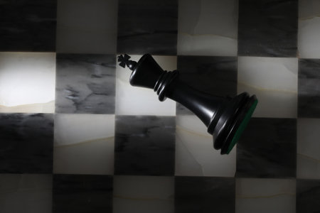 Chess pieces on a chessboard, black and white photo.の写真素材