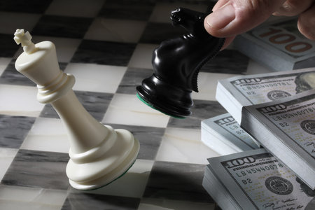 Chess battle on the chessboard with kingの写真素材