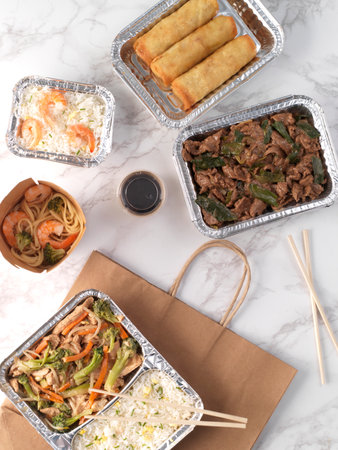 Healthy food delivery concept. Take away of take away meals in foil boxes