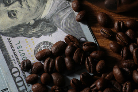 Coffee beans on wooden table, closeup