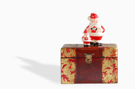 Wooden box decorated with two Santasの写真素材