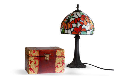 decorated wooden box and Tiffany lamp on white backgroundの写真素材