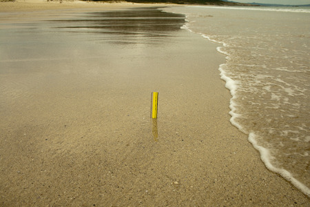 Rule measuring the current sea level rise.の写真素材