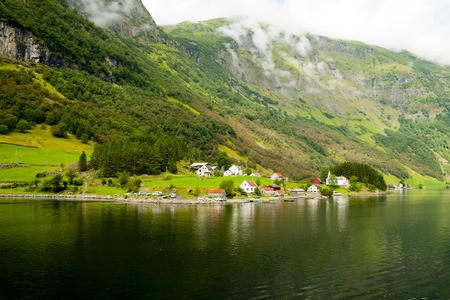 Small village on the edge of a Norwegian fjord.の写真素材
