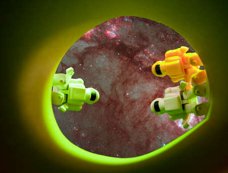 concept of astronauts exploring a mysterious hole in the ground, overhead viewの写真素材