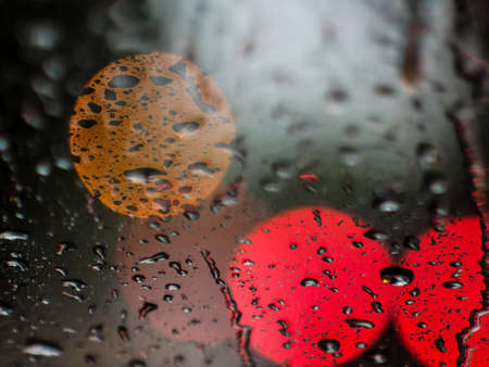 A bright, colourful and rainy nightの写真素材