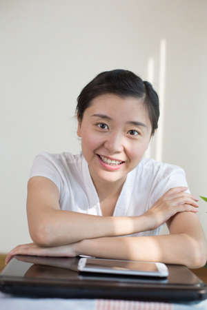 a smiling OL  looking at the  camera lensの写真素材