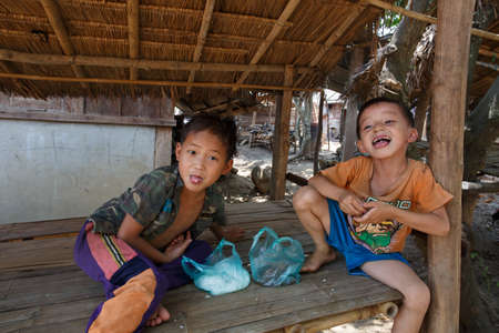 Two little boys in the village of Laosのeditorial素材