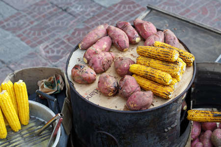 Roadside food stalls, baked sweet potato and cornのeditorial素材