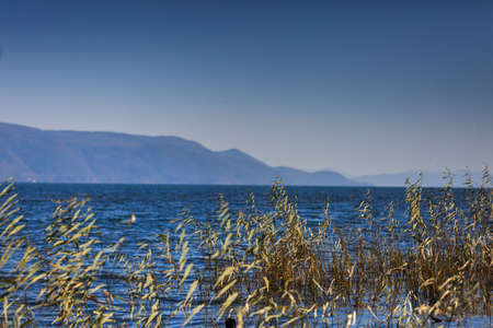 Blue sky reflected in the lakeの写真素材