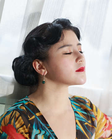 Asian girls are making up face featureの写真素材