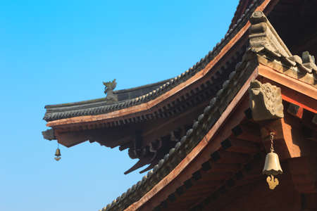 Chinese design on roof details of templeの写真素材