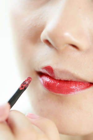 Asian girls are making up face featureの写真素材