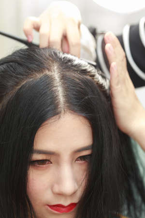 A beautiful asian girl in a haircutの写真素材