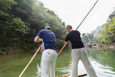 Two men punting on the riverのeditorial素材