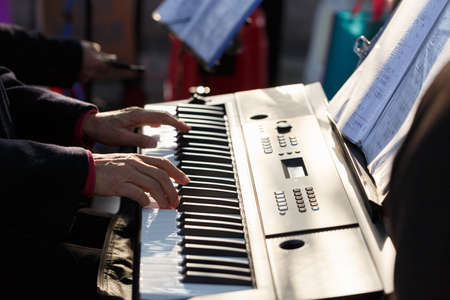 The old man is  playing Electronic organのeditorial素材