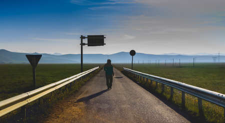 a woman on the roadの写真素材