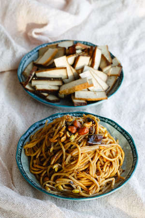A plate of cold noodle and dried bean curd, Chinese cuisineの写真素材