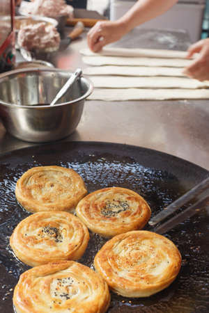 a kind of round baked wheat cake, popular in Sichuan Province,Chinaの写真素材