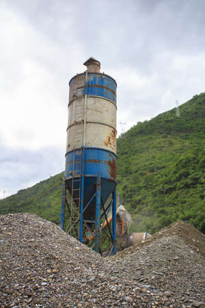 Concrete mixer in river valleyの写真素材