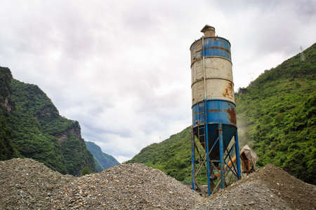 Concrete mixer in river valleyの写真素材