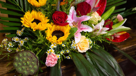 Beautiful bouquet of flowers on wooden background. Selective focus.