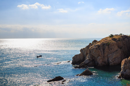 Beautiful seascape with blue sea and blue sky background.の写真素材