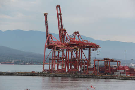 Container Cranes. A pair of container cranes in Vancouver, BC harbour.のeditorial素材