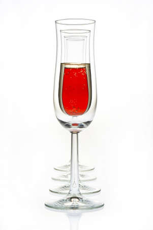 four glasses with champagne, red champagne and empty glassesの写真素材