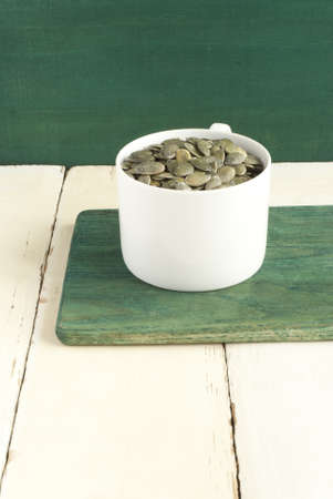 titches in white cup on green cutting boardの写真素材